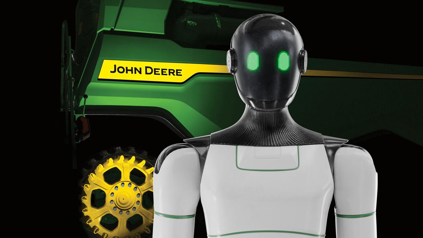 Bild på en robot som står framför tröskan