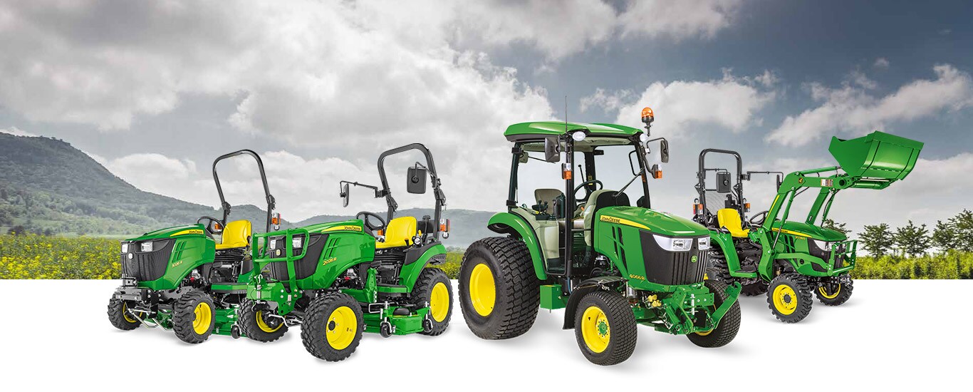 Landscape with group compact utility tractors